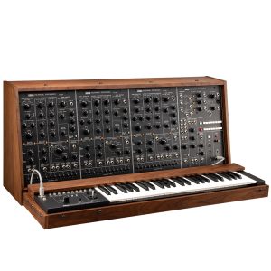 vintage Korg PS-3300 polyphonic analog synthesizer, featuring three large panel sections filled with knobs, sliders, and patch cables, with a full 48-key keyboard beneath