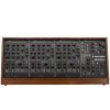 vintage Korg PS-3300 polyphonic analog synthesizer, featuring three large panel sections filled with knobs, sliders, and patch cables, with a full 48-key keyboard beneath