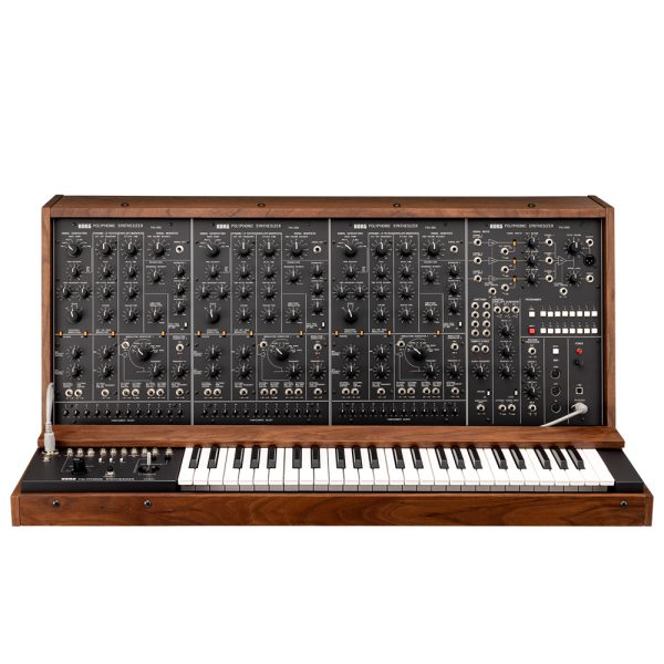 Front view of a vintage Korg PS-3300 polyphonic analog synthesizer, featuring three large panel sections filled with knobs, sliders, and patch cables, with a full 48-key keyboard beneath