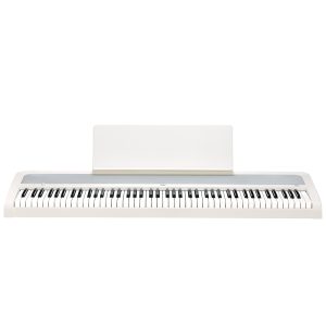 digital piano in black with a full 88-key weighted keyboard, matching stand, and three-pedal unit, shown in a modern home setting
