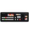 a compact professional hardware control panel with precision knobs, buttons, and faders for live video switching and color grading
