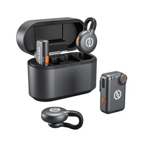 hollyland-lark-m2s-wireless-microphone-system Complete Hollyland LARK M2S Combo wireless mic kit including dual mics, receiver, cables, and charging case arranged on desk