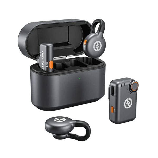 hollyland-lark-m2s-wireless-microphone-system Complete Hollyland LARK M2S Combo wireless mic kit including dual mics, receiver, cables, and charging case arranged on desk